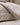 A gold damask print duvet cover with oxford flange and satin stitch border.